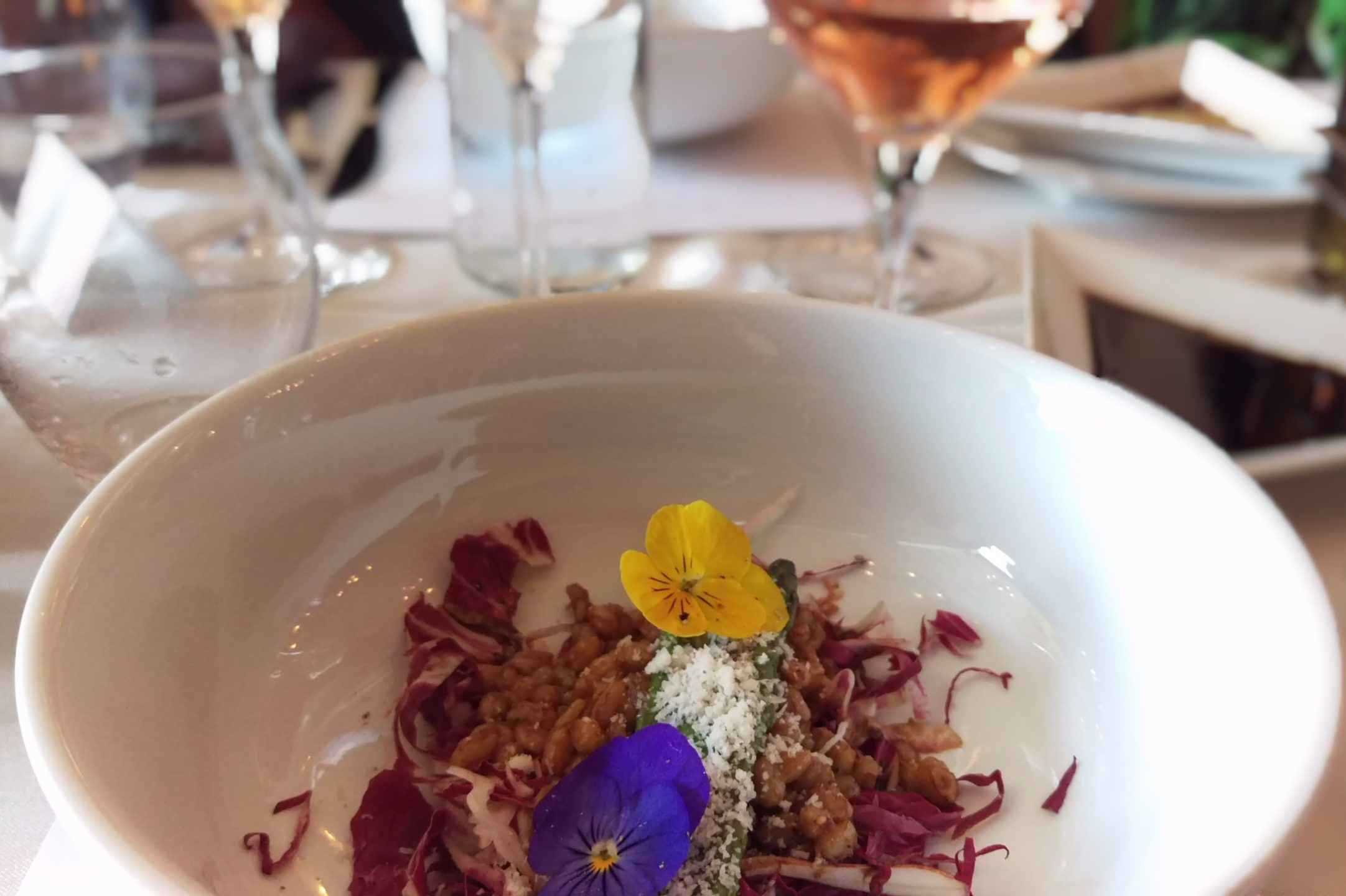 Starting course with edible flowers during Coleman Winemakers Dinner